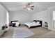 Bright bedroom featuring a king-size bed and plenty of space at 3945 Silverthorn Trce, Cumming, GA 30028