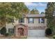 Two story house with stone accents and a two car garage at 3945 Silverthorn Trce, Cumming, GA 30028