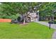 Two-story house with stone accents and a landscaped yard at 3945 Silverthorn Trce, Cumming, GA 30028