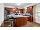Spacious kitchen with granite countertops and island at 3945 Silverthorn Trce, Cumming, GA 30028