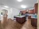 Island kitchen with granite countertops and stainless steel appliances at 3945 Silverthorn Trce, Cumming, GA 30028