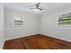 Spacious bedroom featuring hardwood floors and neutral decor at 4090 Tara Dr, Forest Park, GA 30297