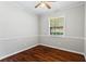 Bright bedroom with hardwood floors and neutral wall colors at 4090 Tara Dr, Forest Park, GA 30297