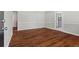 Hardwood floors and neutral walls in the entryway at 4090 Tara Dr, Forest Park, GA 30297