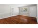Living room with hardwood floors and neutral walls at 4090 Tara Dr, Forest Park, GA 30297