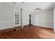 Bright sunroom with wood floors and access to backyard at 4090 Tara Dr, Forest Park, GA 30297