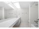 Clean bathroom with a large vanity and a shower/tub combo at 6851 Roswell Rd # I29, Atlanta, GA 30328