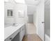 Bathroom features a double vanity and access to bedroom at 6851 Roswell Rd # I29, Atlanta, GA 30328