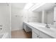 Bright bathroom with double vanity and shower/tub combo at 6851 Roswell Rd # I29, Atlanta, GA 30328