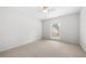 Spacious bedroom with carpeted floors and a ceiling fan at 6851 Roswell Rd # I29, Atlanta, GA 30328