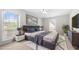 Spacious bedroom with king-size bed, large window, and virtually staged furniture at 6851 Roswell Rd # I29, Atlanta, GA 30328