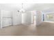Simple dining area with adjacent laundry and access to living room at 6851 Roswell Rd # I29, Atlanta, GA 30328