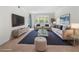 Spacious living room featuring ample natural light and stylish furnishings at 6851 Roswell Rd # I29, Atlanta, GA 30328