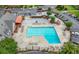 Community pool with lounge chairs and surrounding patio at 6851 Roswell Rd # I29, Atlanta, GA 30328