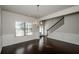 Formal dining room with hardwood floors, chandelier, and wainscoting at 5345 Bucknell Trce, Cumming, GA 30028