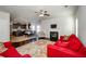 Open concept living room with kitchen and hardwood floors at 5345 Bucknell Trce, Cumming, GA 30028