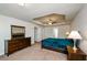 Spacious main bedroom with large dresser and ceiling fan at 5345 Bucknell Trce, Cumming, GA 30028