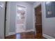Clean bathroom with tub, toilet and wood flooring at 99 Moreland Se Ave, Atlanta, GA 30316