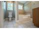 Updated bathroom features a walk-in shower and tile flooring at 99 Moreland Se Ave, Atlanta, GA 30316