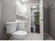 Updated bathroom with tile flooring and vanity at 99 Moreland Se Ave, Atlanta, GA 30316