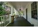 Spacious front porch with wooden flooring and white railings at 99 Moreland Ave Se, Atlanta, GA 30316