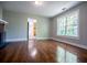 Living room with hardwood floors and view into kitchen at 99 Moreland Se Ave, Atlanta, GA 30316