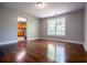 Living room with hardwood floors and view into kitchen at 99 Moreland Se Ave, Atlanta, GA 30316
