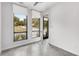 Bedroom with concrete floors and large windows with street view at 105 Georgia Se Ave # 4, Atlanta, GA 30312