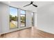 Bright bedroom with hardwood floors and large windows offering street view at 105 Georgia Se Ave # 4, Atlanta, GA 30312