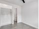 Bright bedroom with built-in shelving and polished concrete floors at 105 Georgia Se Ave # 4, Atlanta, GA 30312