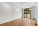 Bright living room with hardwood floors and sliding glass doors to balcony at 105 Georgia Se Ave # 4, Atlanta, GA 30312