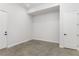 Empty spare room with polished concrete floors and an exterior door at 105 Georgia Se Ave # 4, Atlanta, GA 30312