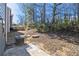 Backyard with wooded area and patio at 2137 Chadwick Road, Atlanta, GA 30331