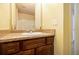 Bathroom with granite vanity and mirror at 2137 Chadwick Road, Atlanta, GA 30331