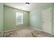 Light green painted bedroom with window and closet at 2137 Chadwick Road, Atlanta, GA 30331