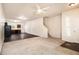 Spacious living room with carpeted floors and a view of the kitchen at 2137 Chadwick Road, Atlanta, GA 30331