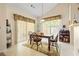 Cozy breakfast nook with table and chairs near sliding doors at 557 Goldfinch Way, Stockbridge, GA 30281