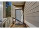 Inviting front door entrance with a covered porch and decorative welcome sign at 622 Royal Crest Ct, Canton, GA 30115