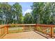 Spacious deck overlooking a private wooded backyard at 712 Dodd Ln # 154, Buford, GA 30518