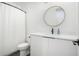 Modern bathroom with white vanity, updated fixtures, and a shower/tub combo at 1099 Hawthorne Ne St, Atlanta, GA 30307