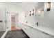 Modern bathroom with double vanity, large shower, and hexagon tile floors at 1099 Hawthorne Ne St, Atlanta, GA 30307