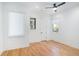 Bright bedroom featuring hardwood floors and a ceiling fan at 1099 Hawthorne Ne St, Atlanta, GA 30307