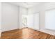 Well-lit bedroom with hardwood floors and sliding glass doors at 1099 Hawthorne Ne St, Atlanta, GA 30307