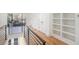 Upstairs hallway with built-in shelving and hardwood floors at 1099 Hawthorne Ne St, Atlanta, GA 30307