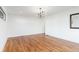 Bright living room with hardwood floors and modern chandelier at 1099 Hawthorne Ne St, Atlanta, GA 30307