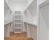 Large walk-in closet with ample shelving and hanging space at 1099 Hawthorne Ne St, Atlanta, GA 30307