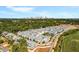 Aerial view of a community with various townhouses and city views at 1187 Rambler Cross, Atlanta, GA 30312