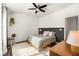 Bedroom with a queen bed, wood accent wall, and ceiling fan at 1187 Rambler Cross, Atlanta, GA 30312