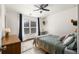 Bright bedroom with a queen bed, window with shutters, and a wood dresser at 1187 Rambler Cross, Atlanta, GA 30312