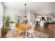 Bright dining room with a wooden table, white chairs, and an open concept design at 1187 Rambler Cross, Atlanta, GA 30312